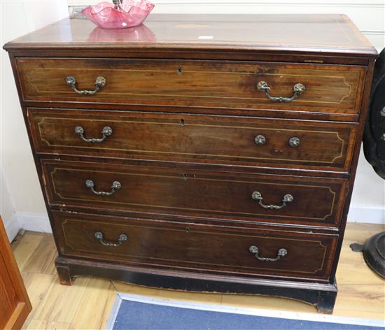 A George III mahogany inlaid chest of drawers W.110cm
